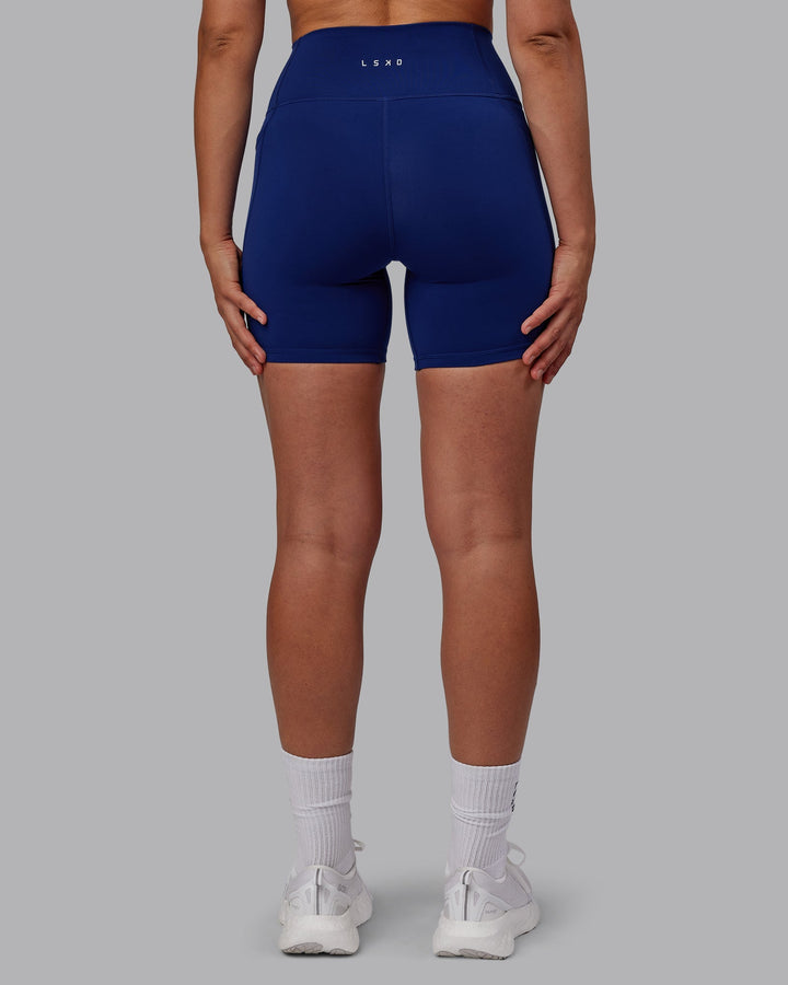 Woman wearing Fusion Mid-Length Shorts - Midnight Blue
