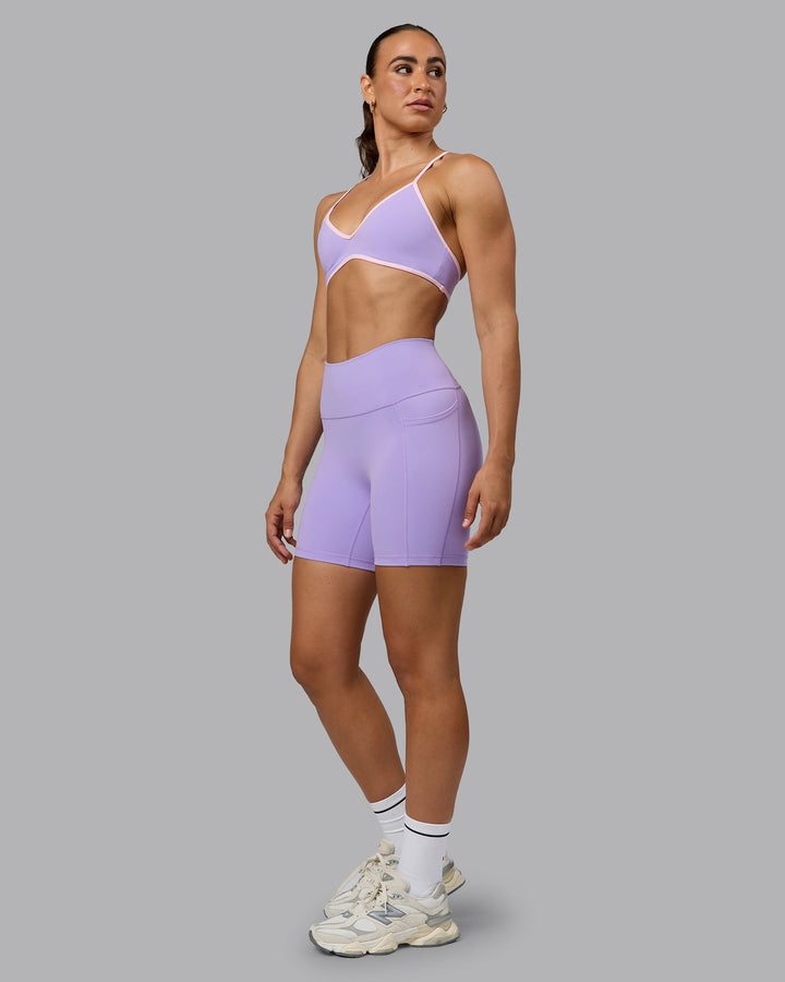 Woman wearing Fusion Mid Short Tights with Pockets - Pale Lilac
