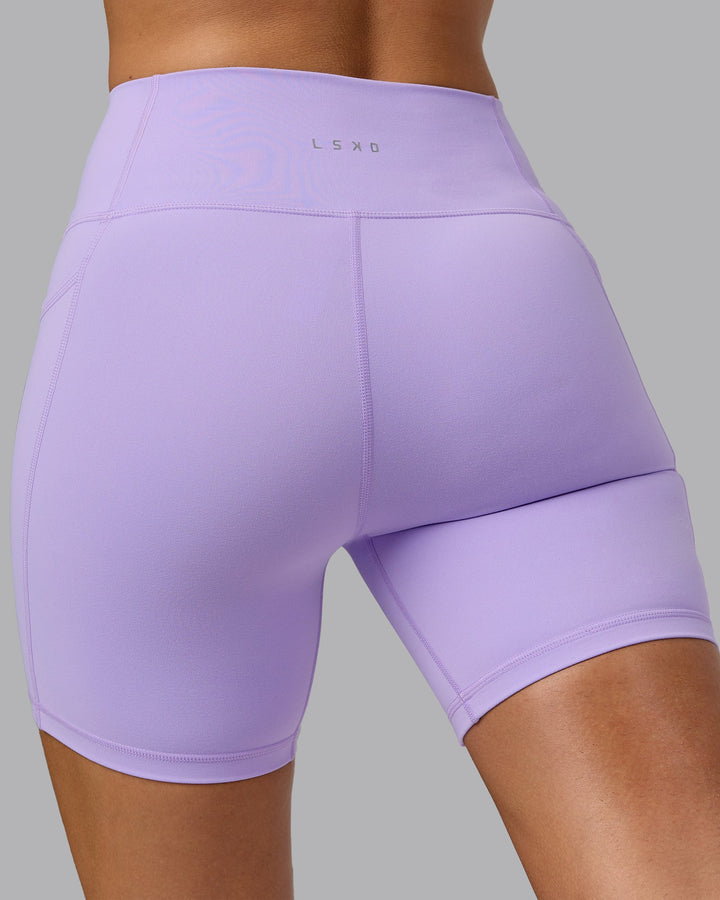 Woman wearing Fusion Mid Short Tights with Pockets - Pale Lilac
