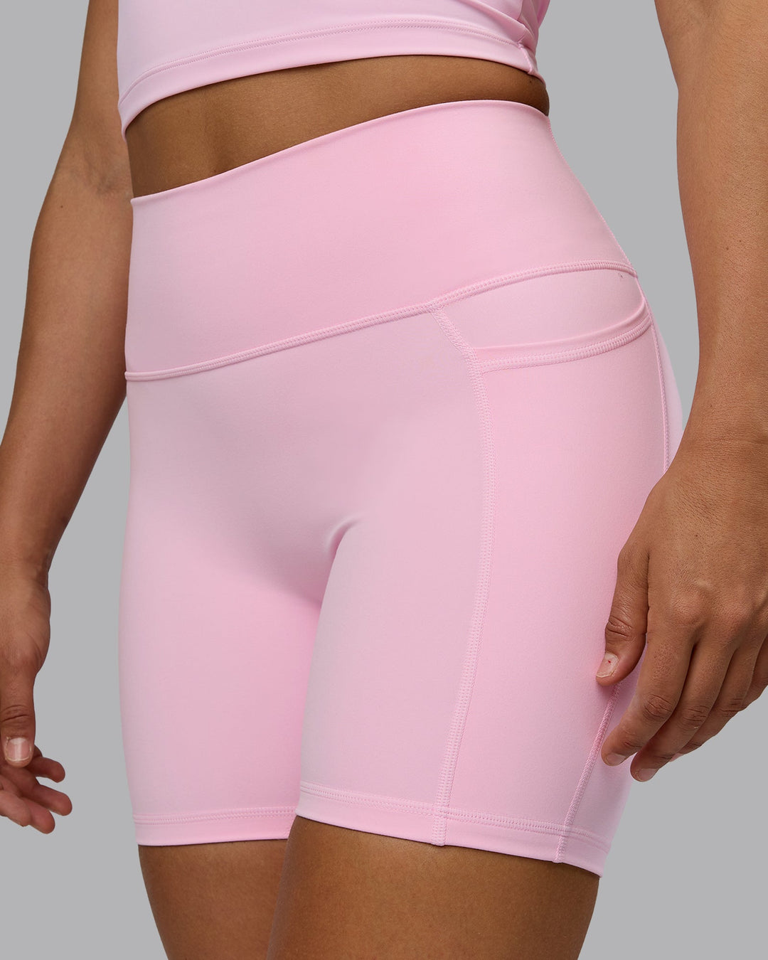 Woman wearing Fusion Mid Short Tights with Pockets - Pale Pink