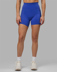 Woman wearing Fusion Ultra High-Rise 6" Short Pockets - Power Cobalt | Model:Hannah | Size:S