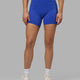 Woman wearing Fusion Mid-Length Shorts - Power Cobalt