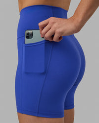Woman wearing Fusion Ultra High-Rise 6" Short Pockets - Power Cobalt | Model:Hannah | Size:S