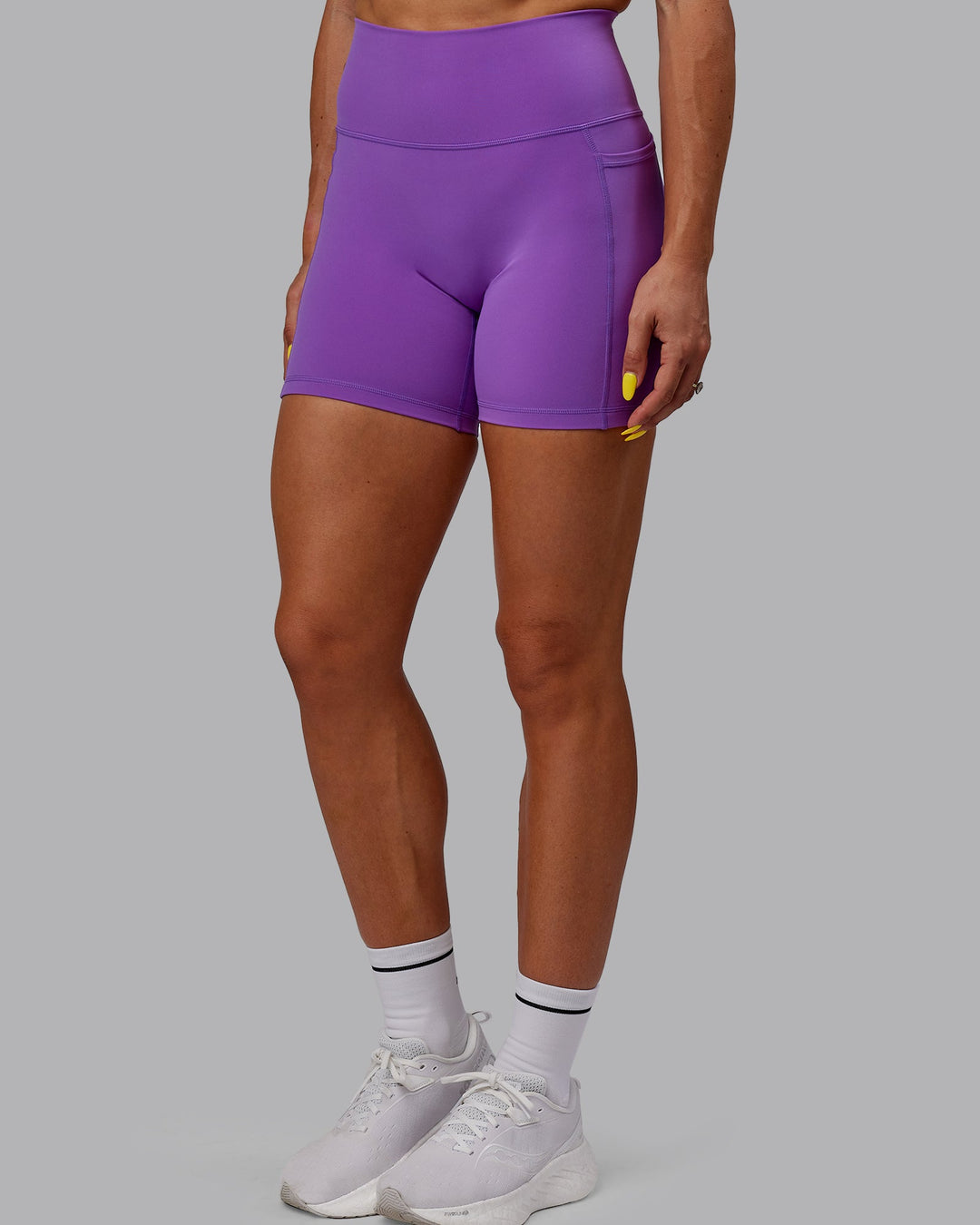 Woman wearing Fusion Mid-Length Shorts - Purple Swirl