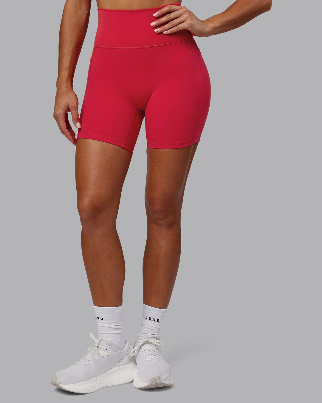 Woman wearing Fusion Mid-Length Shorts - Scarlet