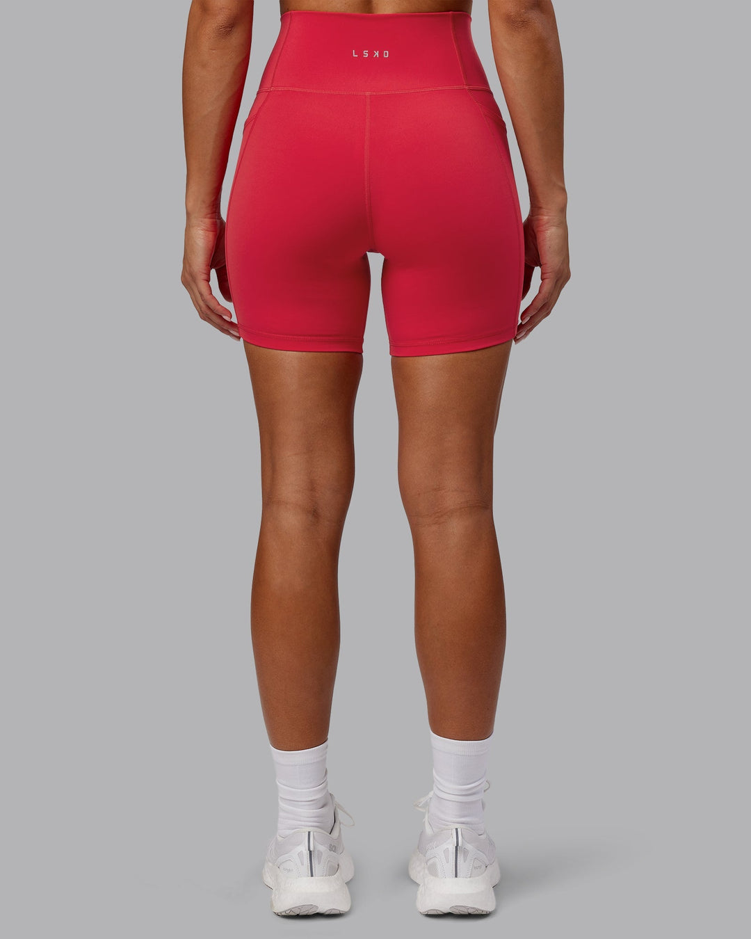 Woman wearing Fusion Mid-Length Shorts - Scarlet