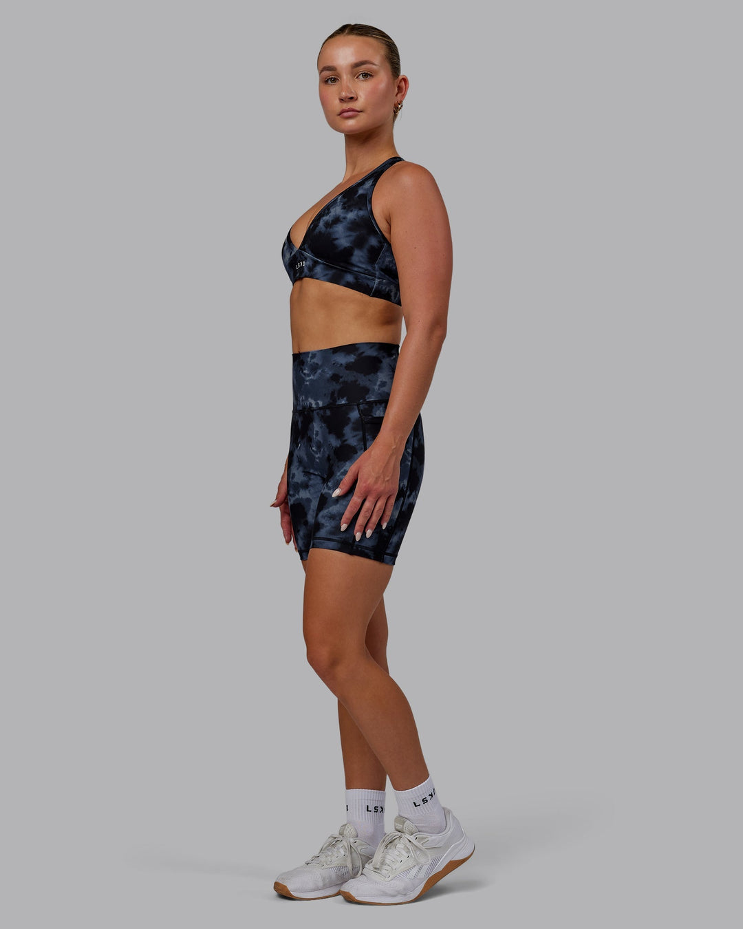 Woman wearing Fusion Mid-Length Shorts - Tie Dye-Midnight