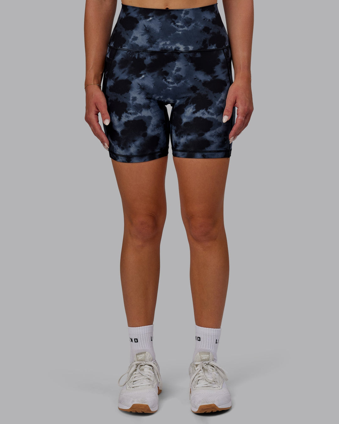 Woman wearing Fusion Mid-Length Shorts - Tie Dye-Midnight