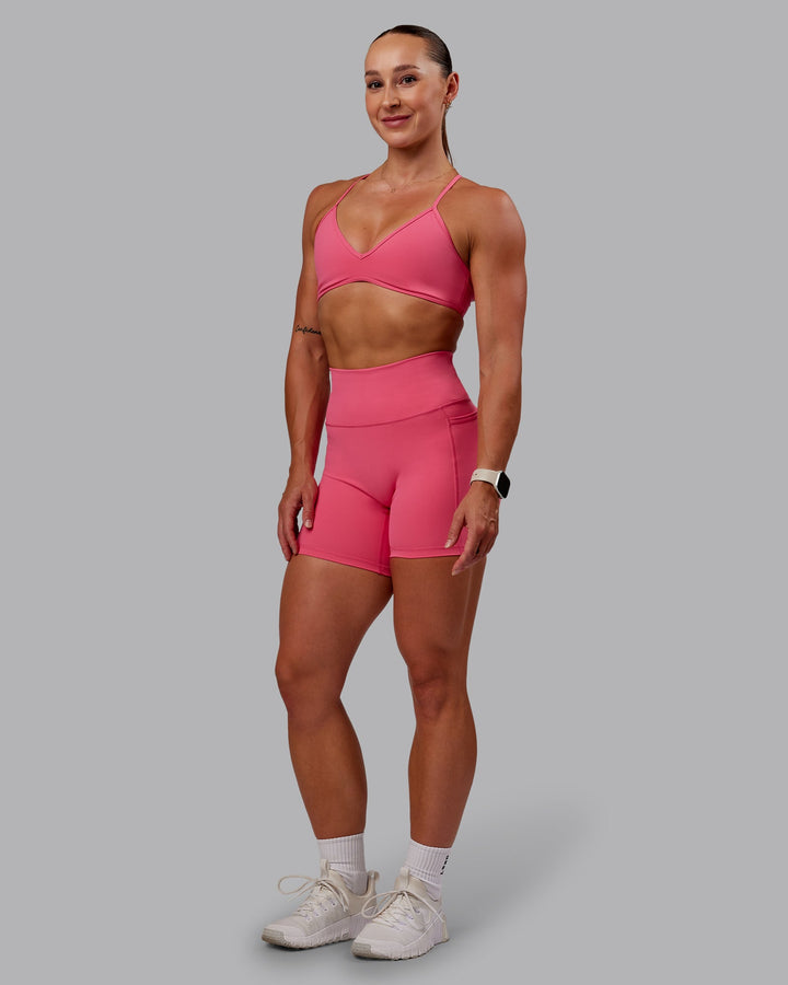 Woman wearing Fusion Mid Short Tight With Pockets - Hot Pink
