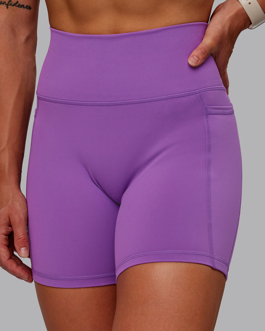 Woman wearing Fusion Mid Short Tight With Pockets - Purple Fizz