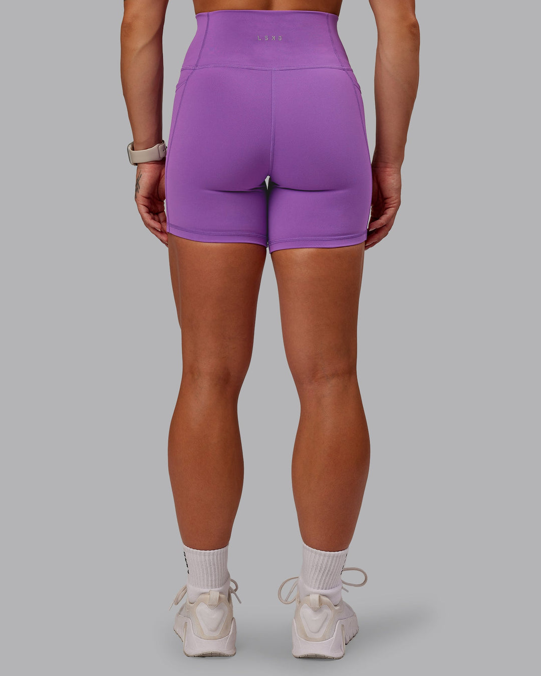 Woman wearing Fusion Mid Short Tight With Pockets - Purple Fizz