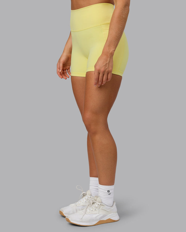 Woman wearing Fusion X-Short Tights With Pockets - Lemon Fizz
