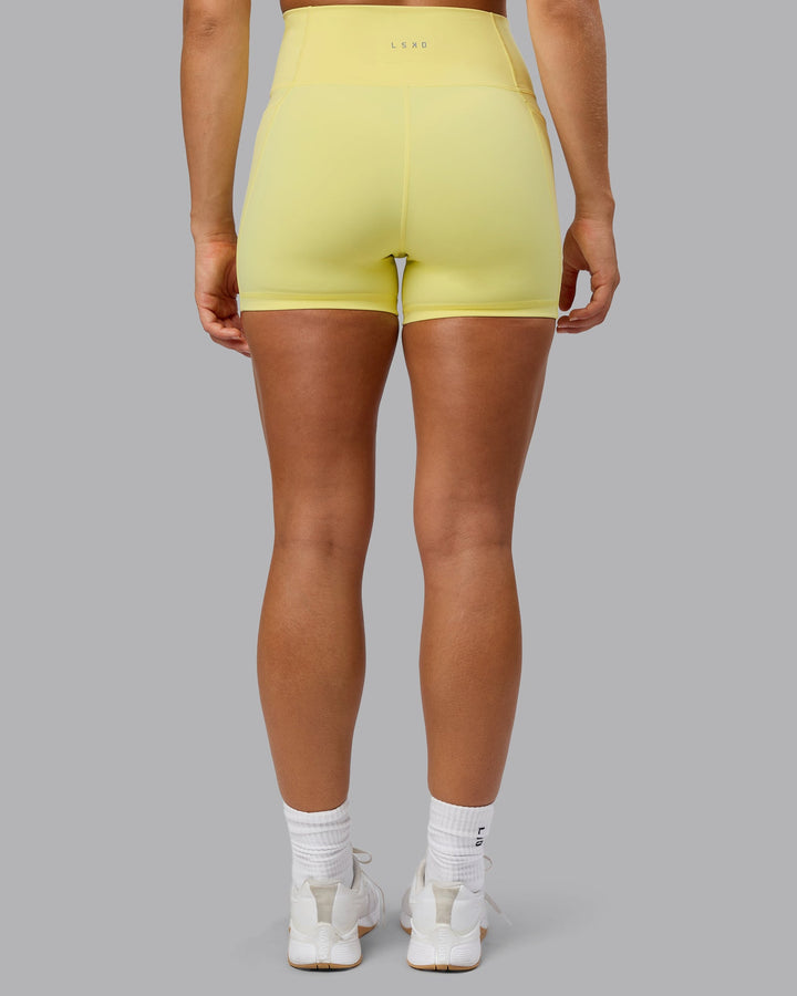 Woman wearing Fusion X-Short Tights With Pockets - Lemon Fizz
