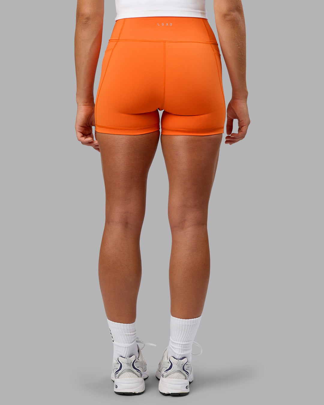 Woman wearing Fusion X-Short Tights with Pockets - Mandarin