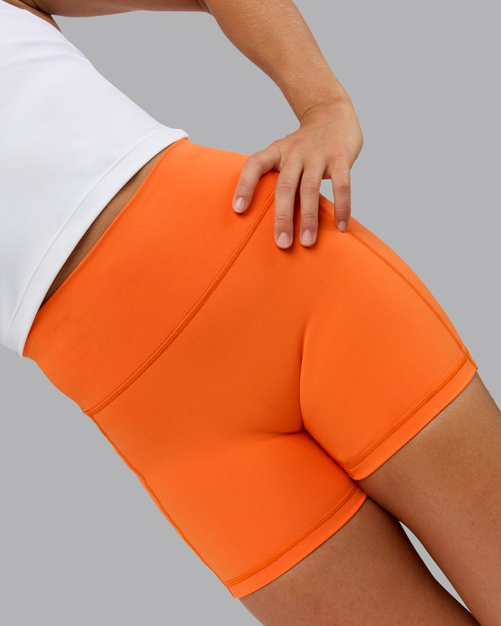 Woman wearing Fusion X-Short Tights with Pockets - Mandarin
