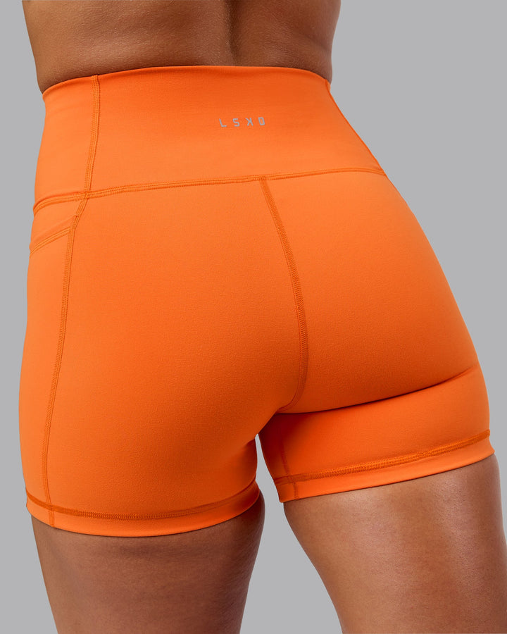 Woman wearing Fusion X-Short Tights with Pockets - Mandarin
