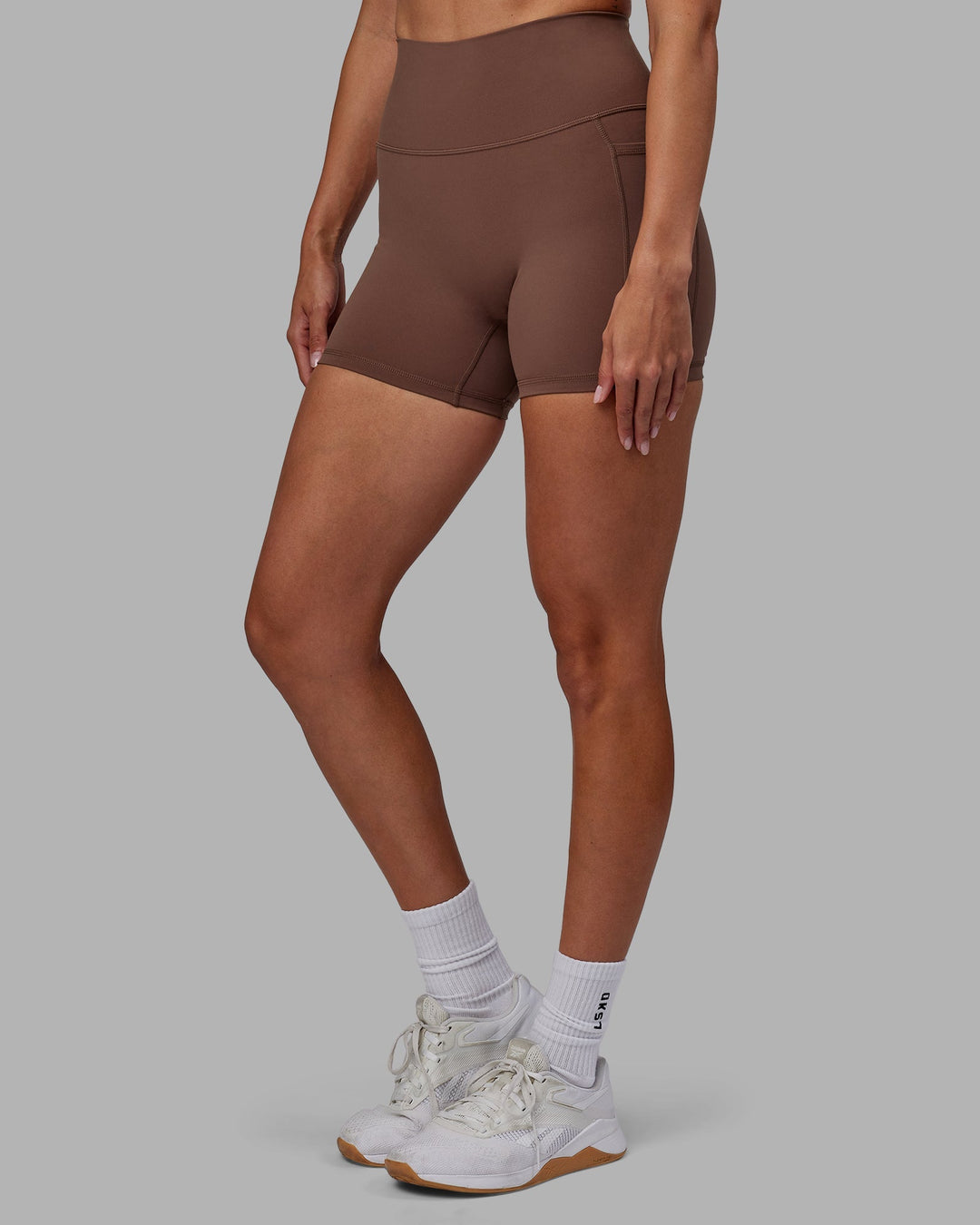 Woman wearing Fusion X-Length Shorts - Dull Rust