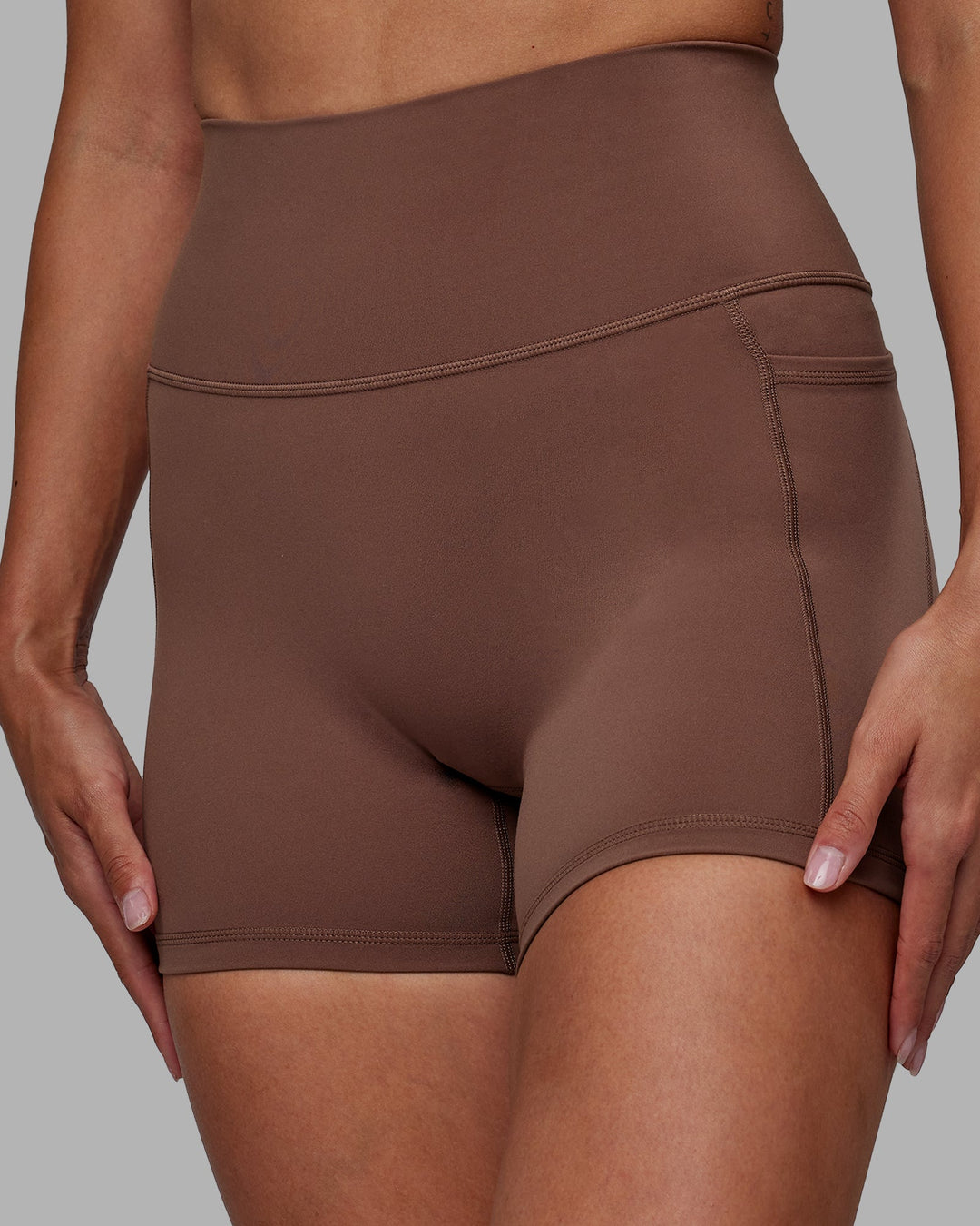 Woman wearing Fusion X-Length Shorts - Dull Rust