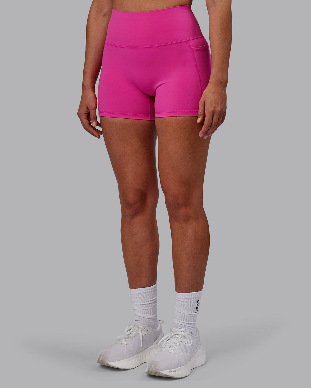 Woman wearing Fusion X-Length Shorts - Fuchsia Pink