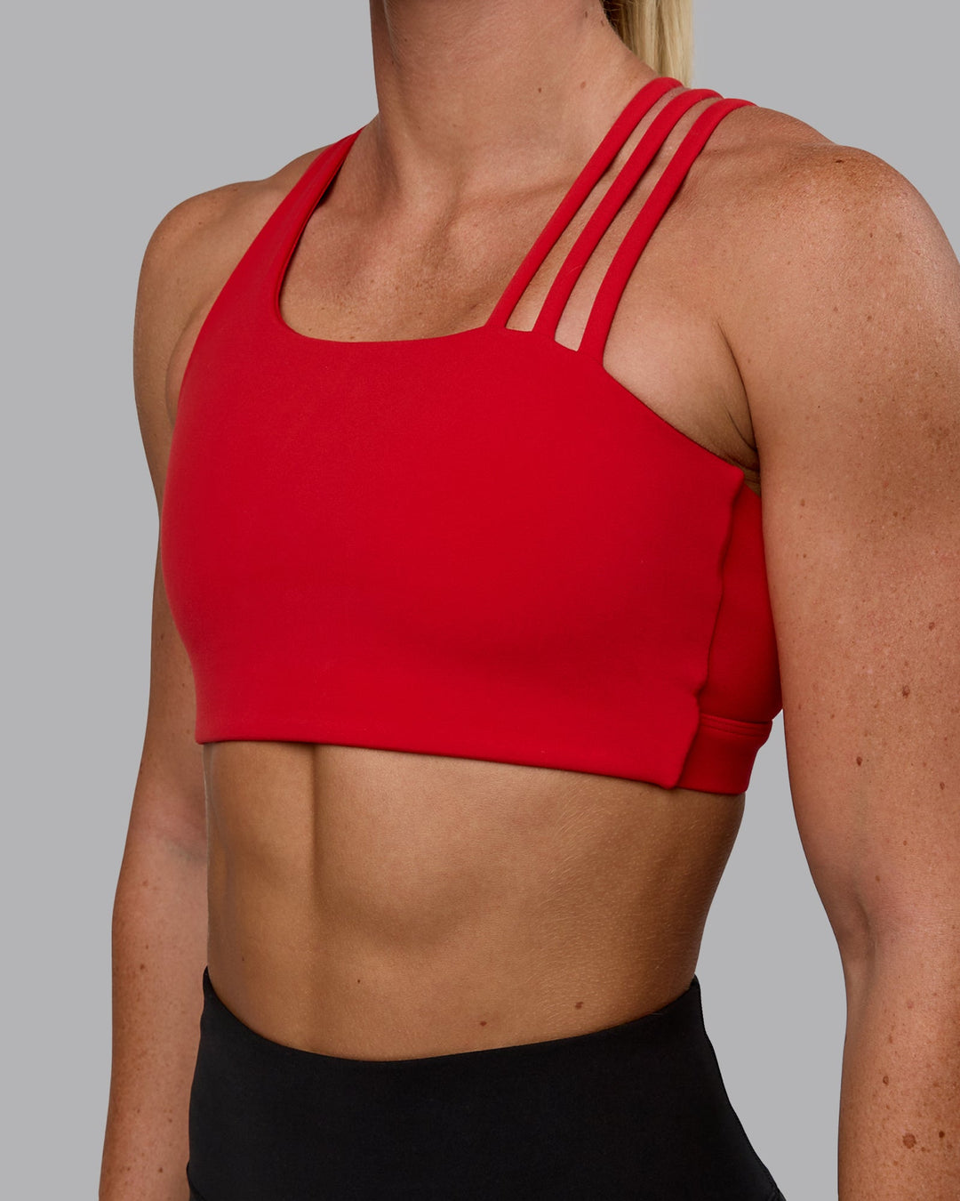 Woman wearing Galvanise Sports Bra - Crimson