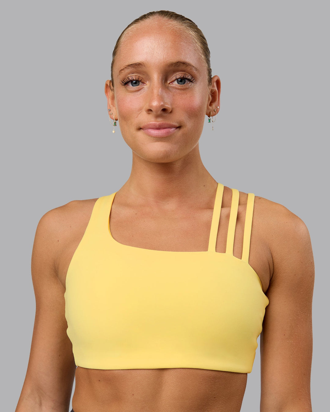 Woman wearing Galvanise Sports Bra - Lemon