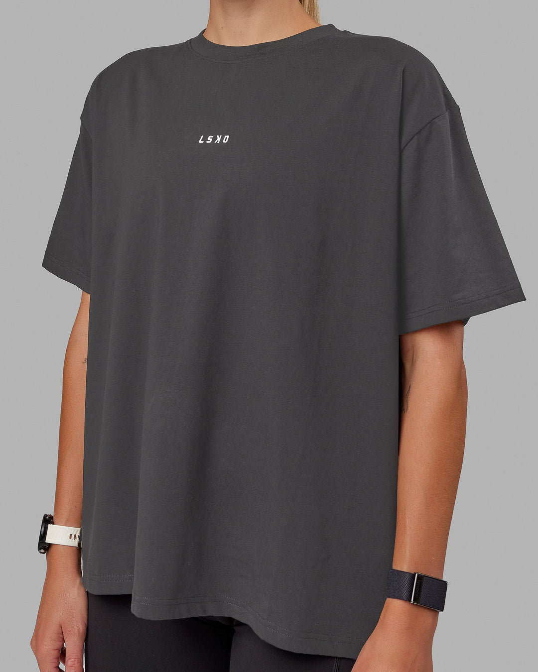 Woman wearing Go-To FLXCotton Oversized Tee - Dark Storm-White