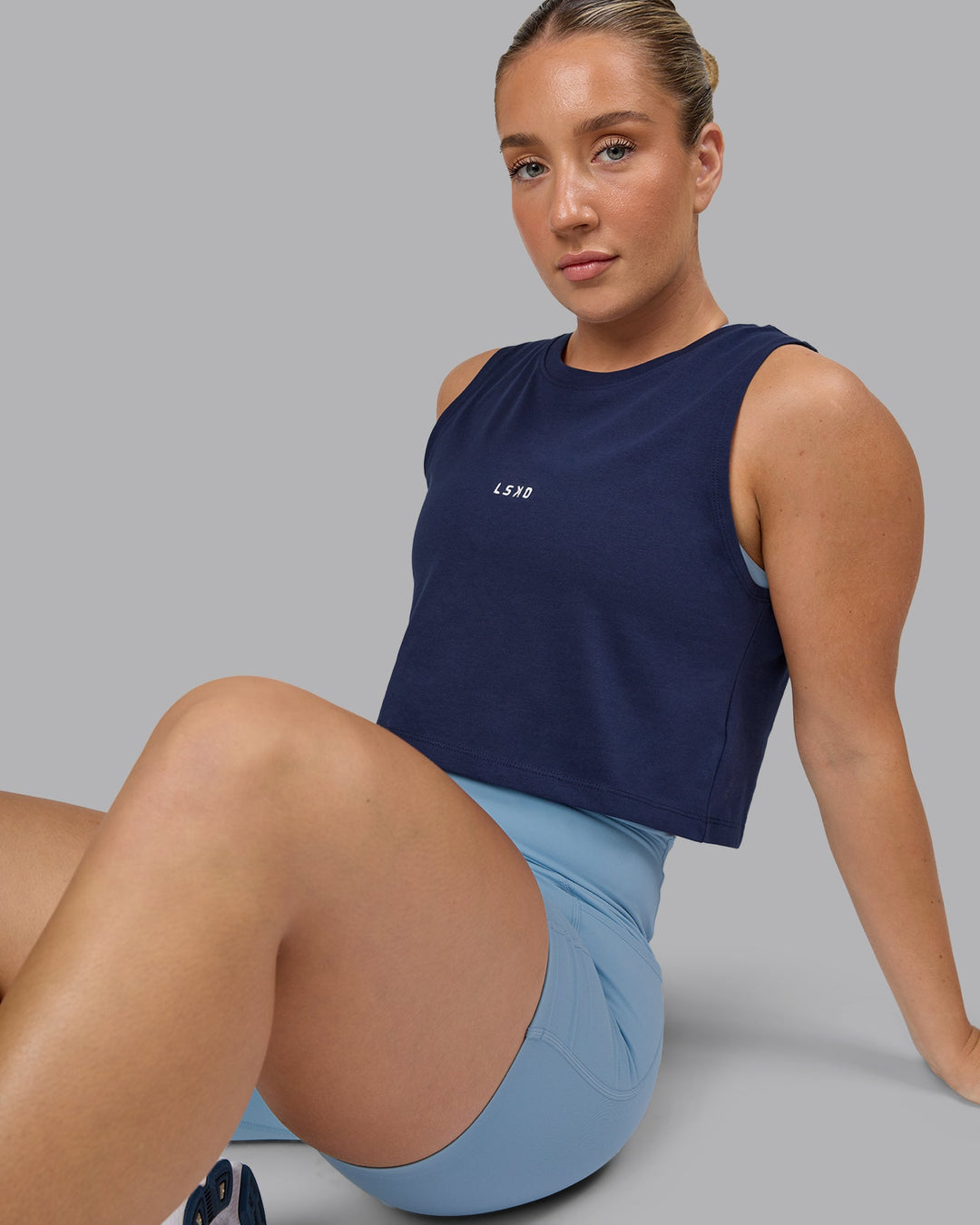 Woman wearing Go-To FLXCotton Tank - Future Navy-White