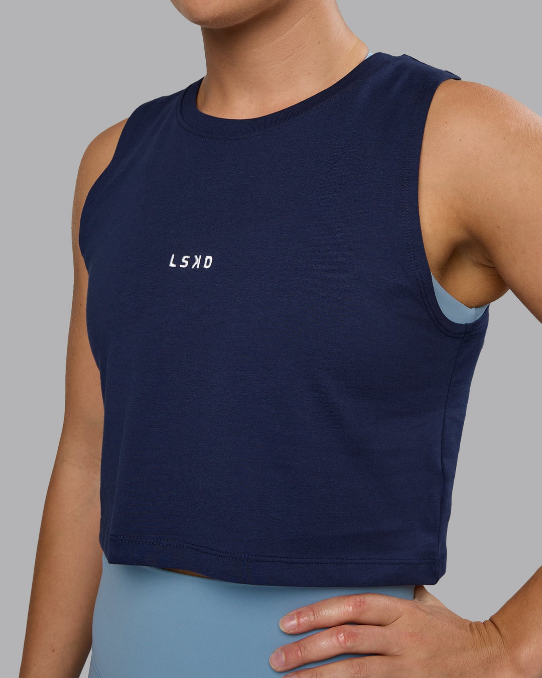Woman wearing Go-To FLXCotton Tank - Future Navy-White