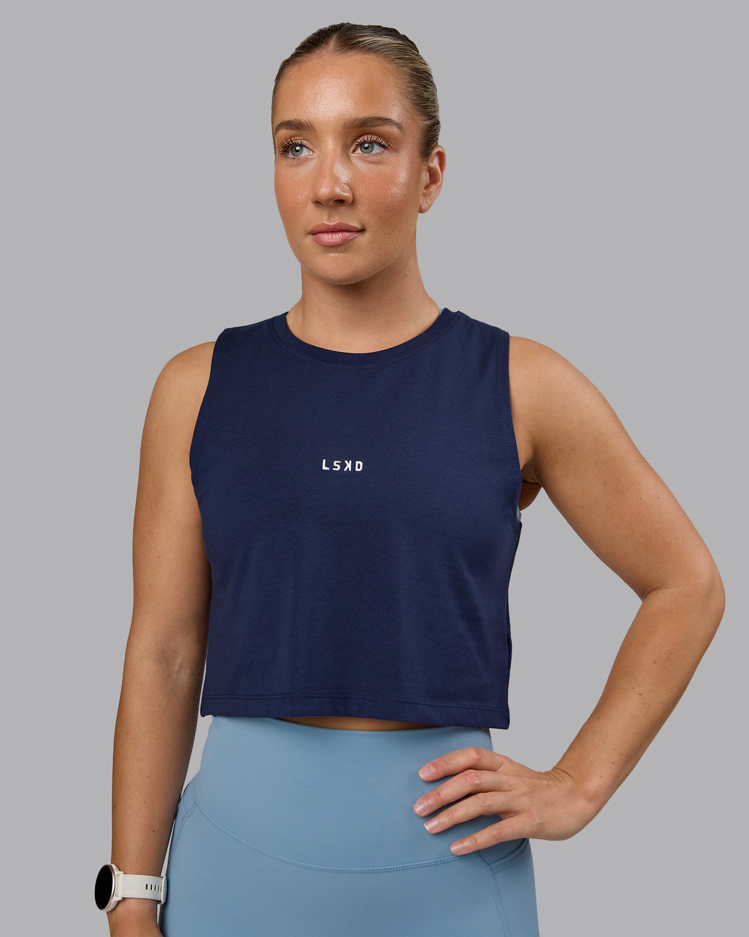 Woman wearing Go-To FLXCotton Tank - Future Navy-White