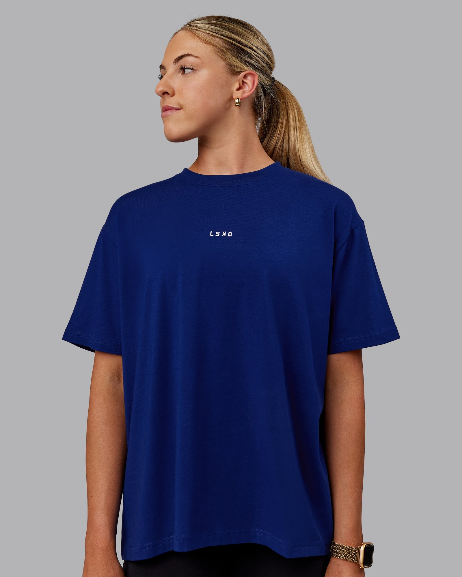Woman wearing Go-To FLXCotton Oversized Tee - Midnight Blue