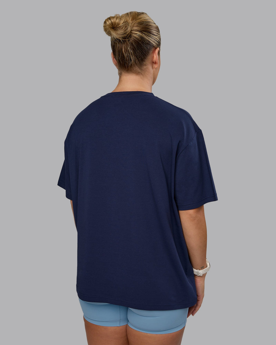 Woman wearing Go-To FLXCotton Oversized Tee - Future Navy-White