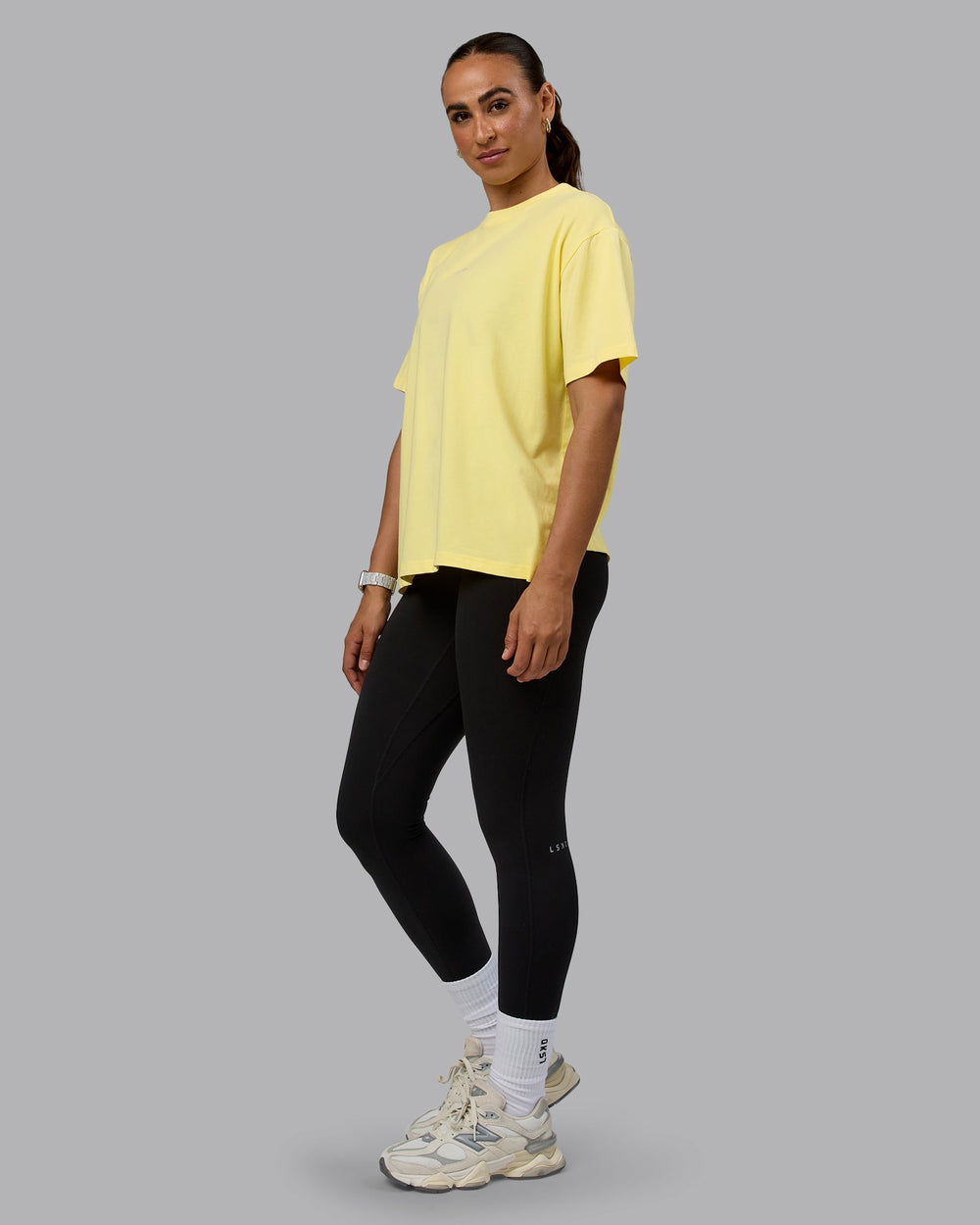 Woman wearing Go-To FLXCotton Oversized Tee - Lemon-White