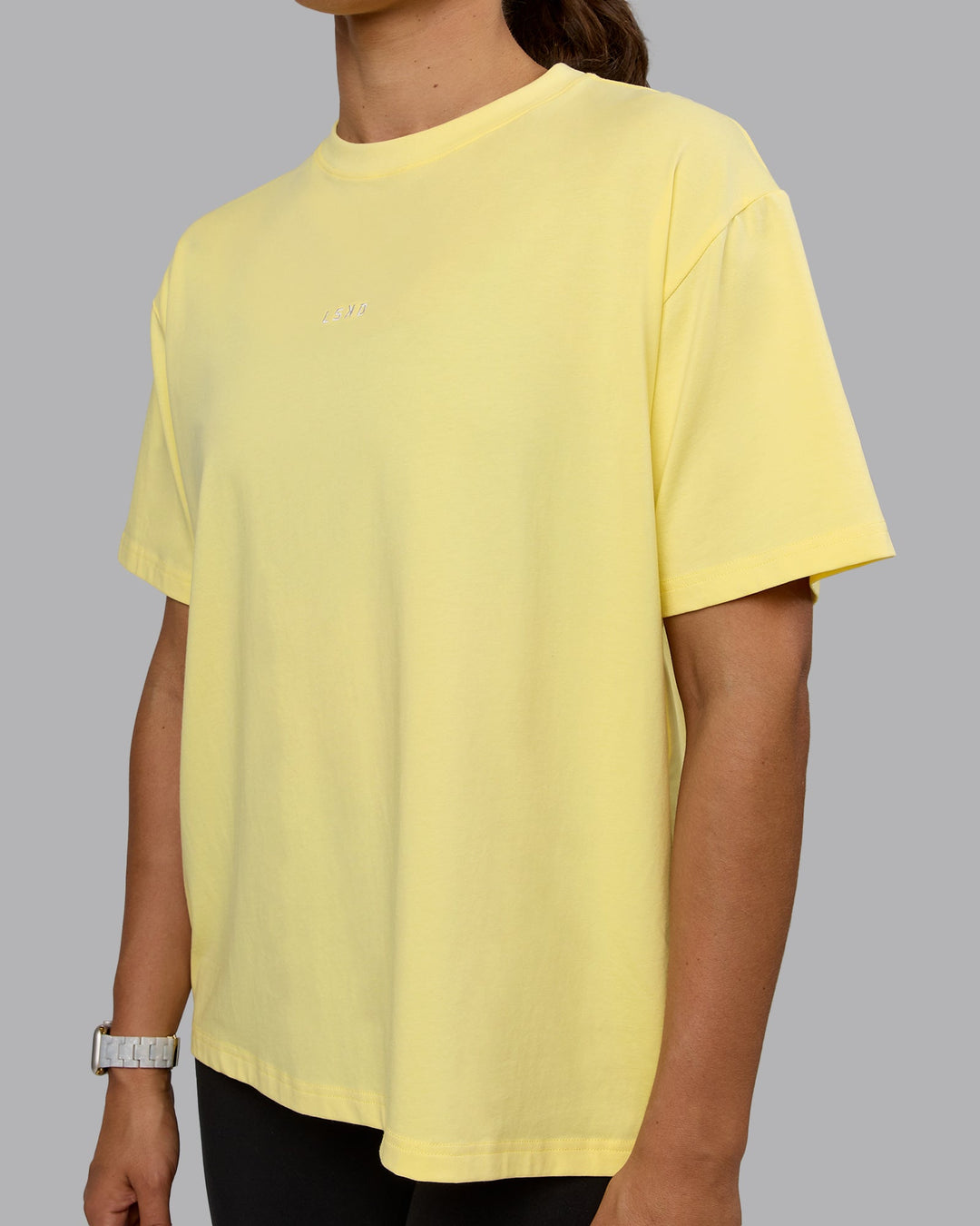 Woman wearing Go-To FLXCotton Oversized Tee - Lemon-White