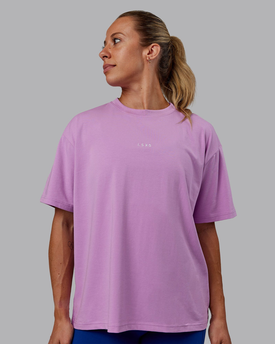 Woman wearing Go-To FLXCotton Oversized Tee - Light Violet-White