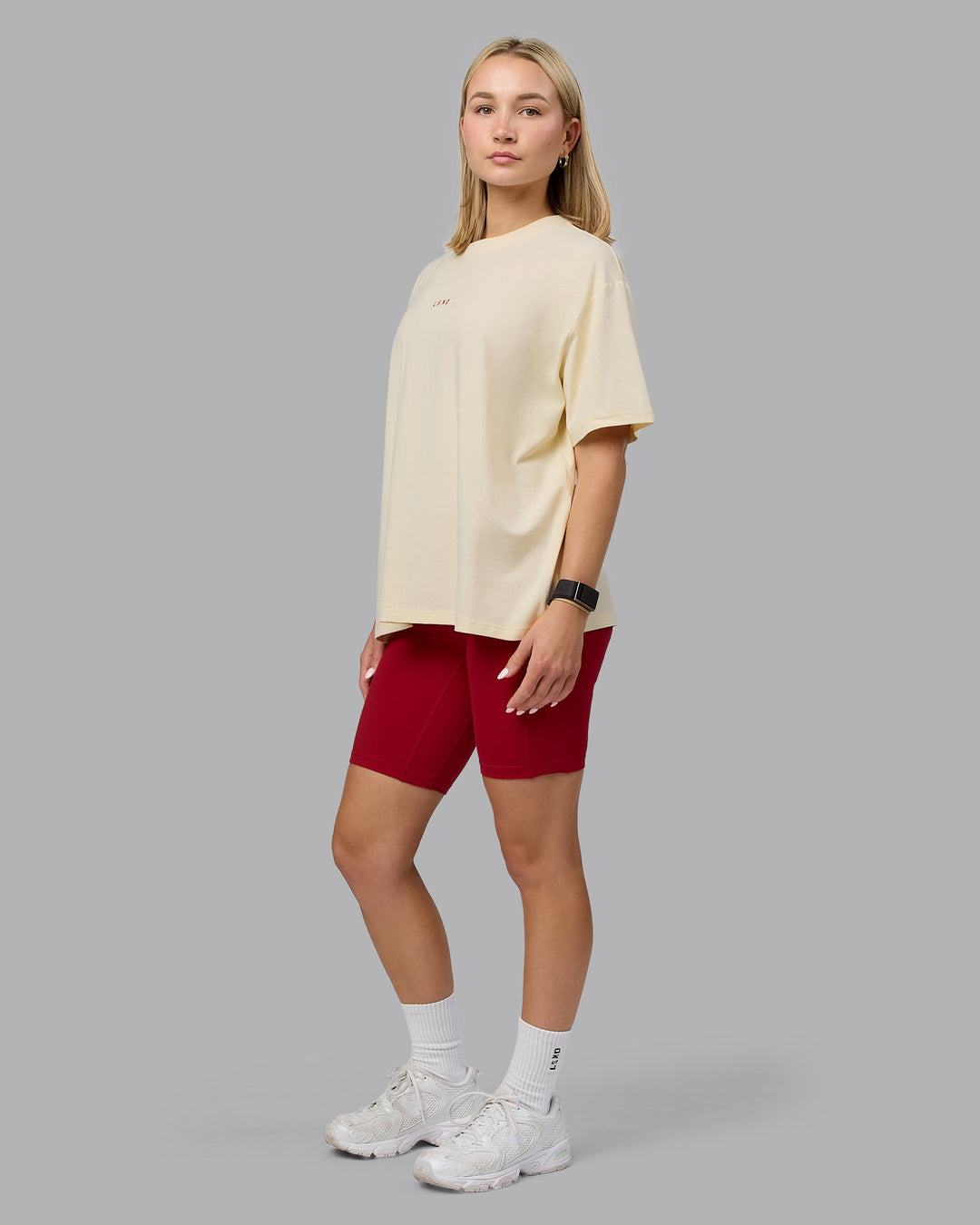 Woman wearing Go-To FLXCotton Oversized Tee - Ivory-Cherry Red