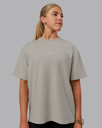 Woman wearing Go-To FLXCotton Oversized Tee - Shale Beige | Thumbnail Index: 0