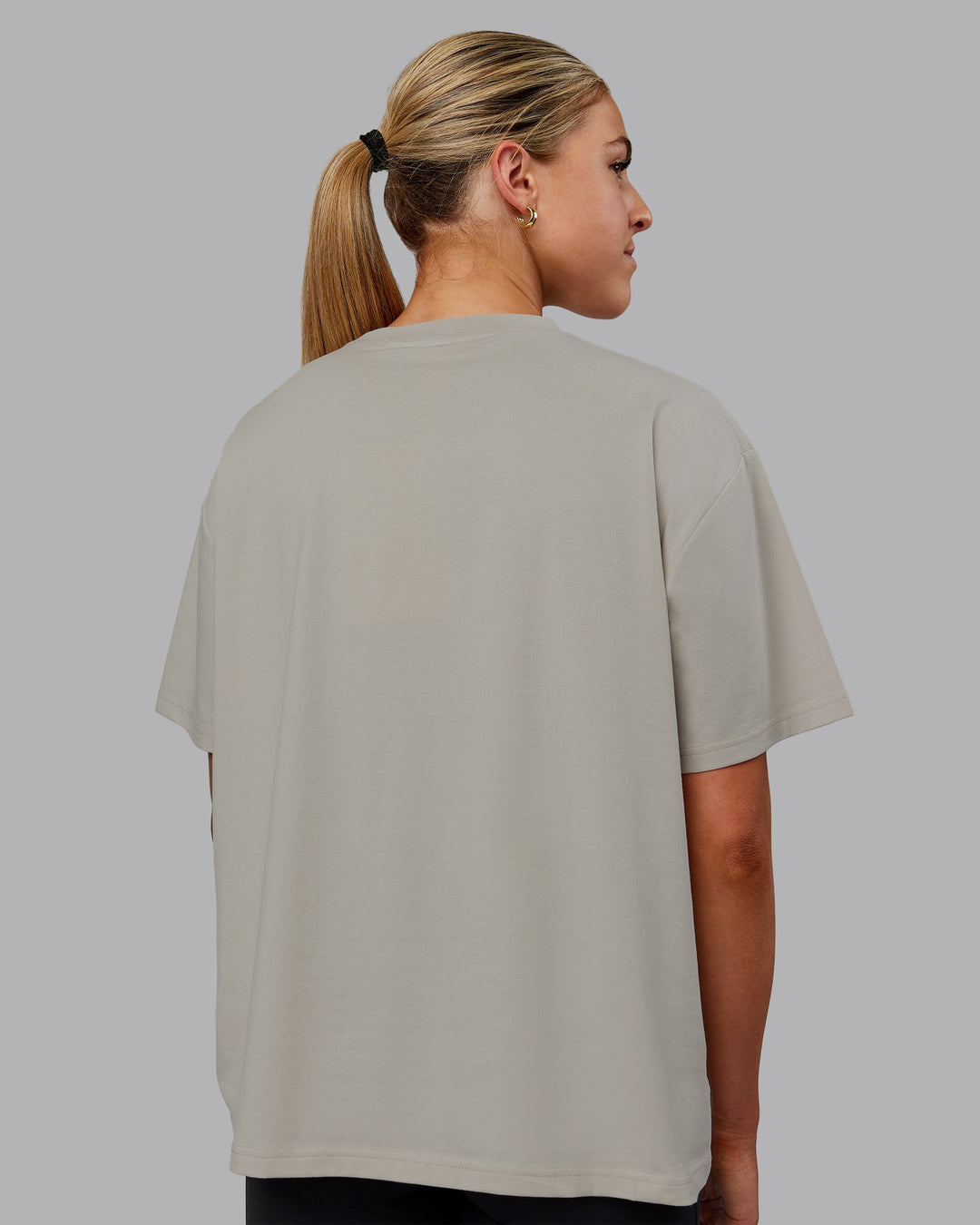 Woman wearing Go-To FLXCotton Oversized Tee - Shale Beige