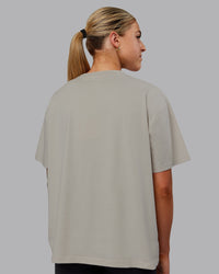 Woman wearing Go-To FLXCotton Oversized Tee - Shale Beige | Thumbnail Index: 3