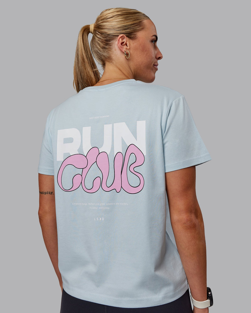 Woman wearing Gone Running FLXCotton Tee - Skyride-Bubblegum