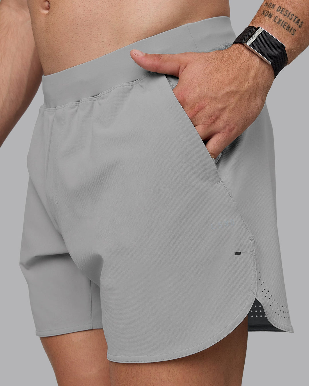 Man wearing Lift 6&quot; Lined Performance Shorts - Circular Grey