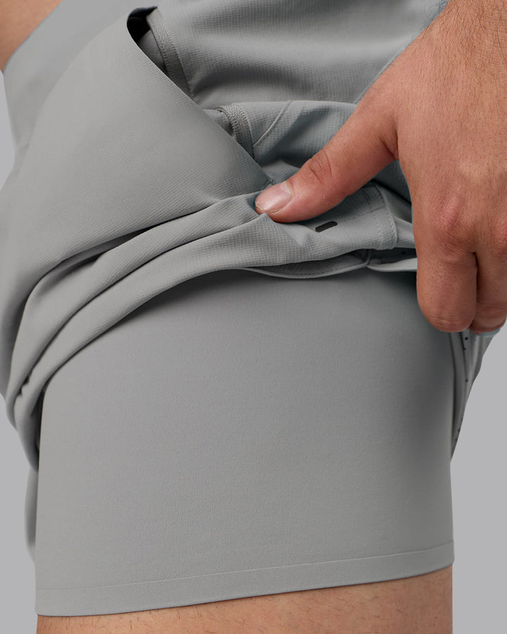 Man wearing Lift 6&quot; Lined Performance Shorts - Circular Grey
