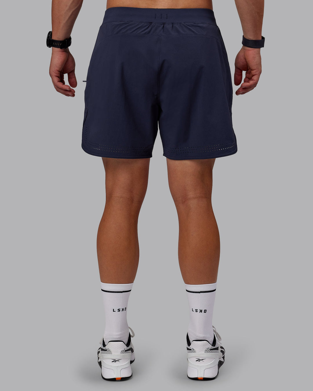 Man wearing Lift 6&quot; Lined Performance Shorts - Future Navy