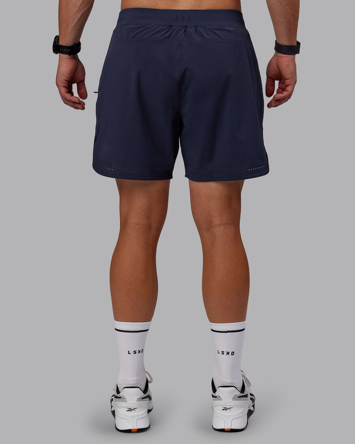 Man wearing Lift 6&quot; Lined Performance Shorts - Future Navy
