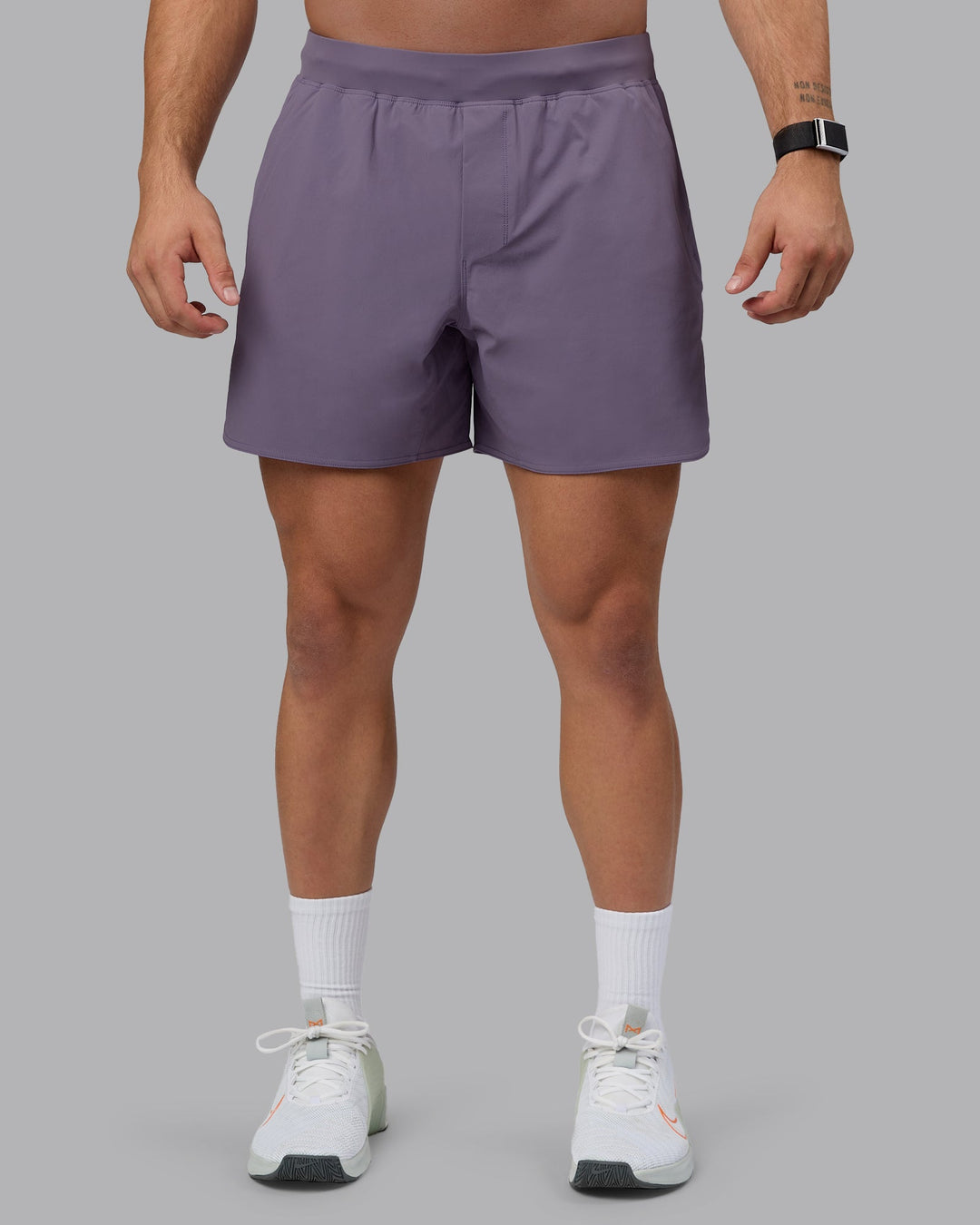 Man wearing Lift 6&quot; Lined Performance Shorts - Purple Sage