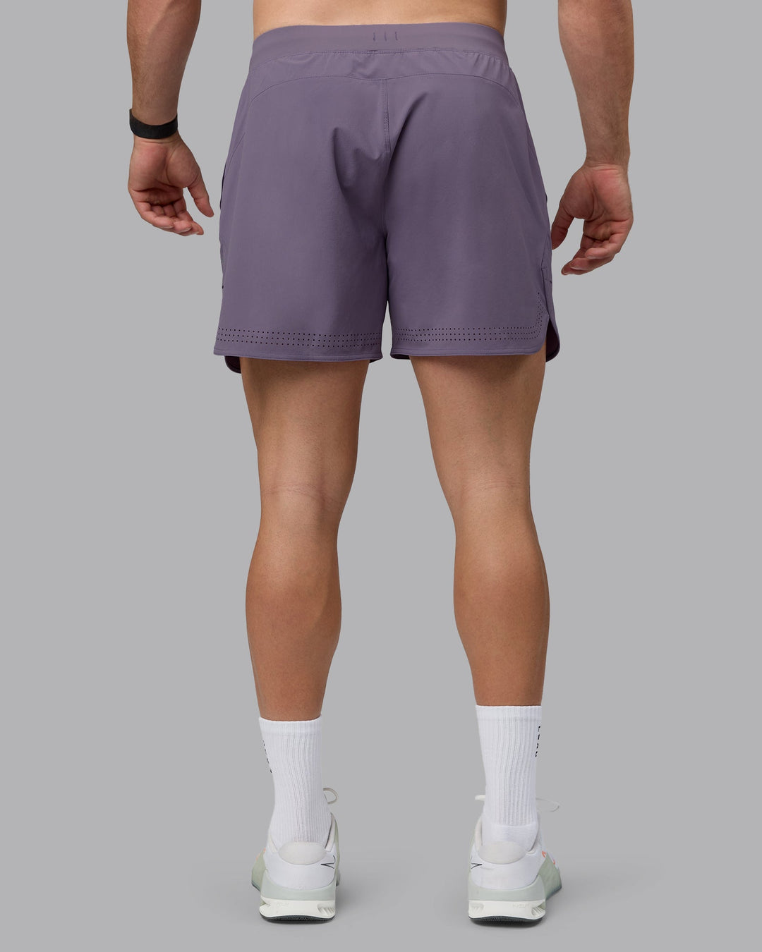 Man wearing Lift 6&quot; Lined Performance Shorts - Purple Sage