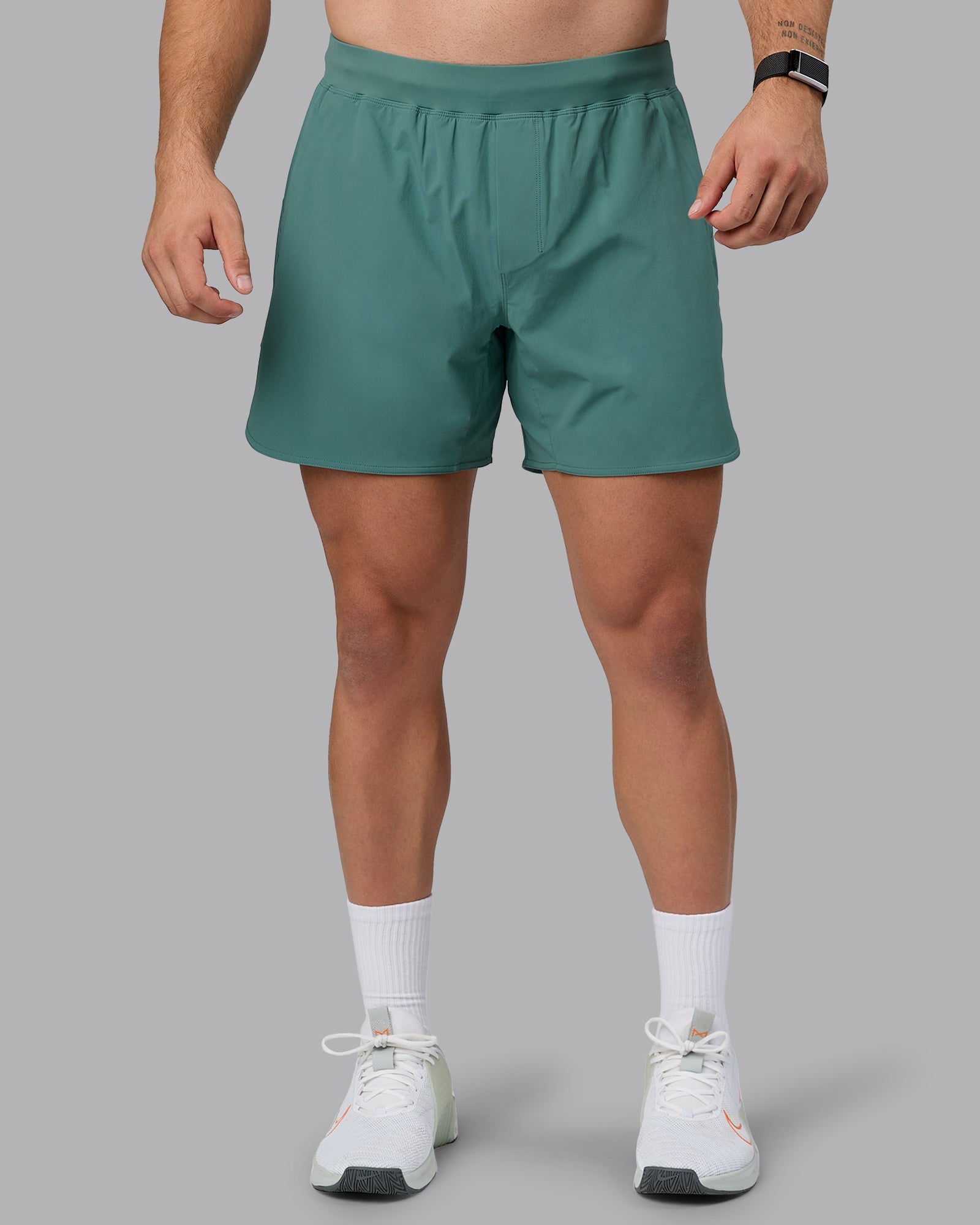 Man wearing Lift 6" Lined Performance Shorts - Sagebrush