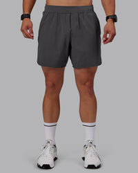 Man wearing Lift 6" Performance Shorts - Dark Storm