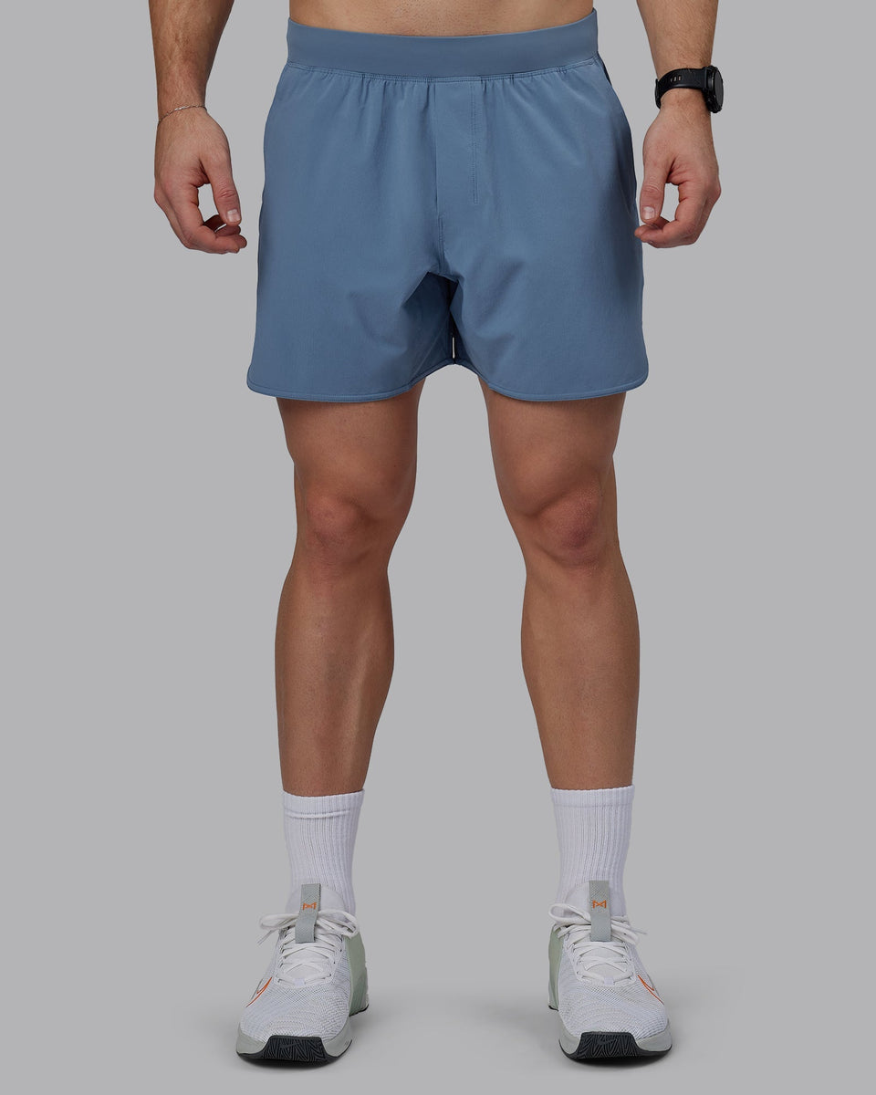 Man wearing Lift 6" Performance Shorts - Elemental Blue