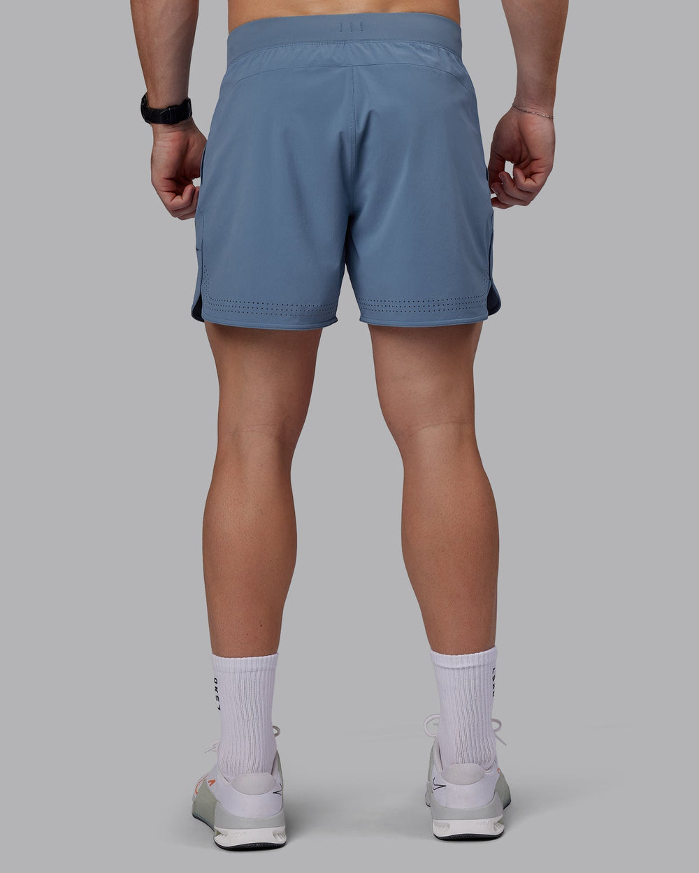 Man wearing Lift 6" Performance Shorts - Elemental Blue