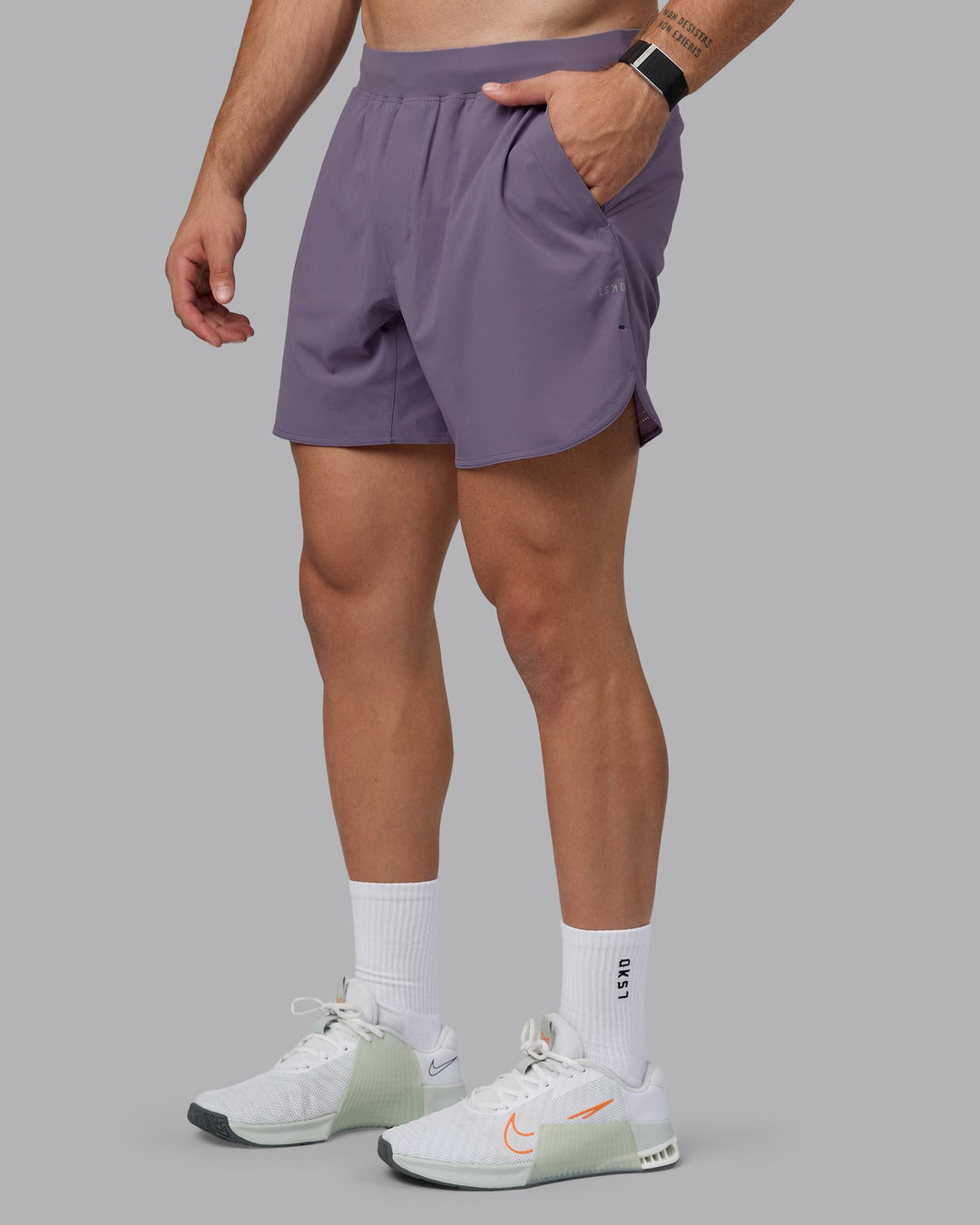 Man wearing Lift 6&quot; Performance Shorts - Purple Sage